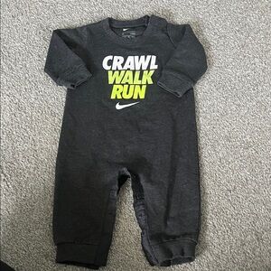 Nike Black Baby Romper with White and Neon Yellow 'Crawl Walk Run' Print
